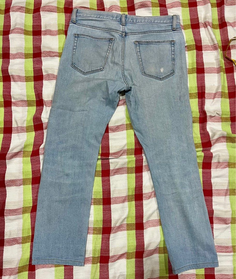 Uniqlo Jeans - Size 30 (Category: Jeans) located in Las Pinas. Submitted by sober_stuff (Listing ID 1415682621, Image 3). Description: - Uniqlo light blue jeans - Size 30 (76cm) - Classic five-pocket design - Zip fly - Distressed details - Made of cotton and spandex.