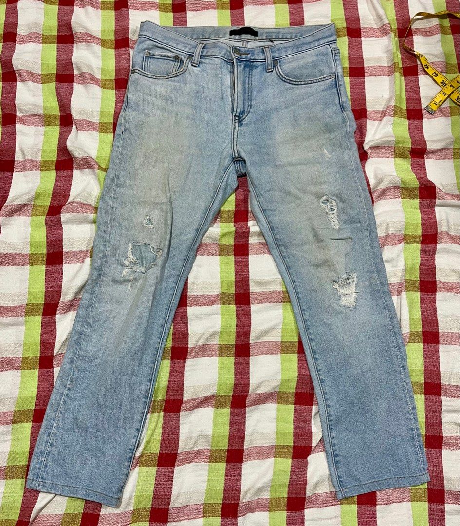 Uniqlo Jeans - Size 30 (Category: Jeans) located in Las Pinas. Submitted by sober_stuff (Listing ID 1415682621, Image 1). Description: - Uniqlo light blue jeans - Size 30 (76cm) - Classic five-pocket design - Zip fly - Distressed details - Made of cotton and spandex.