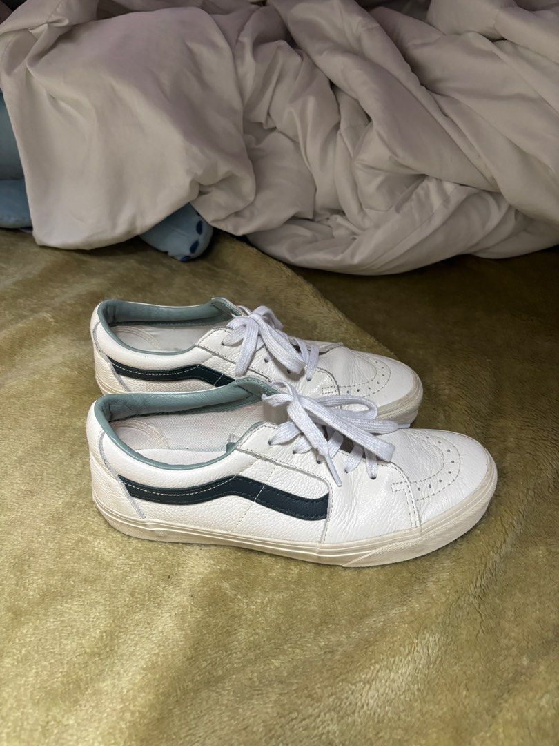 Vans Sk8-Low Leather Sneakers (Category: Sneakers) located in Manila. Submitted by coolwinddd (Listing ID 1415636694, Image 2). Description: - Vans Sk8-Low leather sneakers - Color: White with dark blue side stripe - Features: - Lace-up closure - Padded collar - Insole details: US Men 8, US Women 9.5, UK 7.5, EUR 40.5, CM 26 - Sole: White - Interior lining: Light blue.