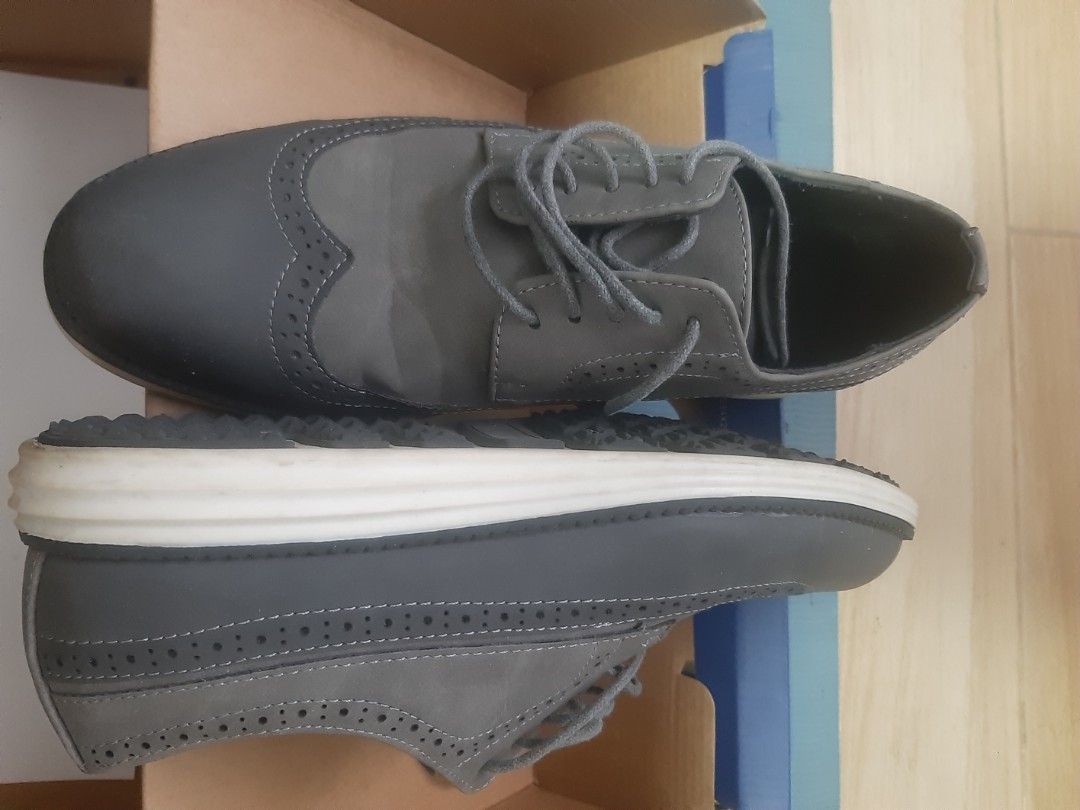 Wingtip gray shoes (Category: Casual Shoes) located in Quezon City. Submitted by rpcast (Listing ID 1415794484, Image 3). Description: 2-tone gray shoes used sparingly SM brand.