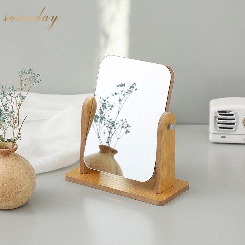 Wooden Tabletop Mirror (Category: Mirrors) located in Manila. Submitted by pandakto (Listing ID 1415733874, Image 1). Description: - Wooden tabletop mirror - Rectangular mirror surface - Natural wood frame - Sturdy base - Adjustable side supports for tilting - Ideal for makeup application or decoration - Easy assembly (as shown in images) - Needs cleaning.