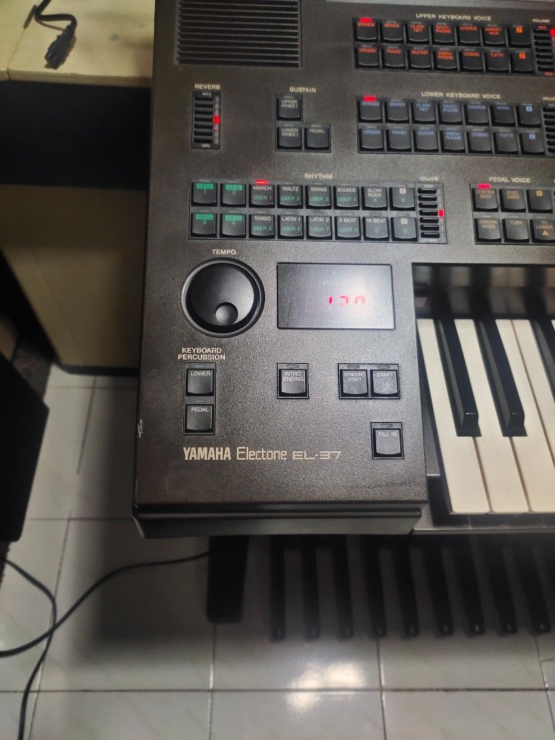 Yamaha Electone EL-37 Electronic Organ (Category: Musical Instruments) located in Quezon City. Submitted by gwace1717 (Listing ID 1415821278, Image 1). Description: - Yamaha Electone EL-37 electronic organ - Features multiple keys and control panels - Includes a display screen - Dark gray finish - In good working condition - Ideal for musicians and music learners.