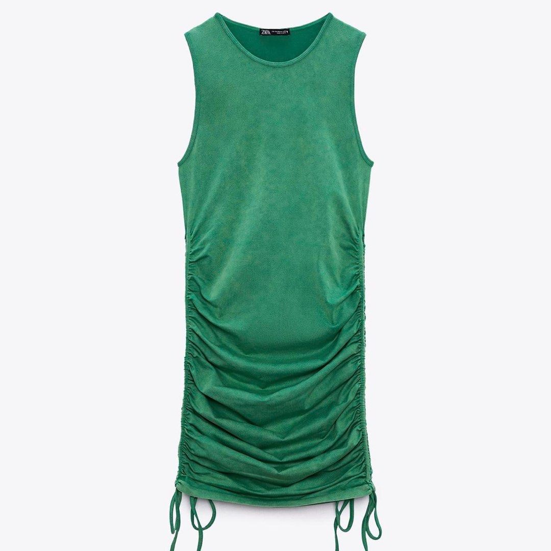 Zara Green Ruched Dress (Category: Dresses) located in Las Pinas. Submitted by mdacloset (Listing ID 1415687302, Image 2). Description: - Zara green mini dress - Size: XS - S - Ruched detailing - Adjustable drawstrings for a customizable fit - Soft, textured fabric - Stretchy material .