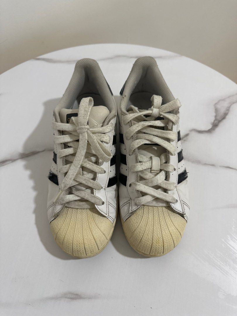 Adidas Superstar Sneakers - Original (Category: Sneakers) located in Manila. Submitted by mingmingtsu_ (Listing ID 1415864757, Image 1). Description: Original - well used For W7 feet.