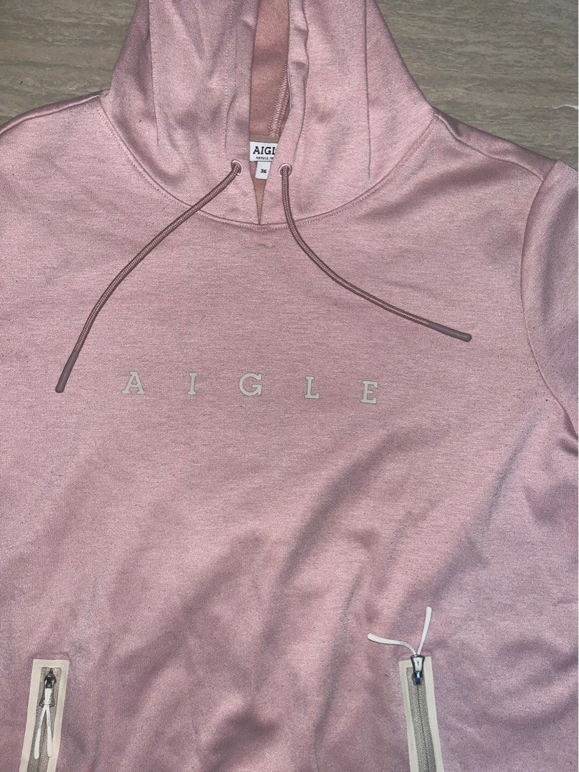 Aigle 1853 Heritage Hoodie (Category: Coats, Jackets and Outerwear) located in Lipa City. Submitted by coolthreadss (Listing ID 1415824044, Image 2). Description: • Brand: Aigle — Established in France, 1853. • Style: A premium technical pullover that combines the comfort of a sweatshirt with the durability of outdoor gear. • Color: Classic Heather Gray. • Design: * Features the iconic "Aigle 1853" circular seal logo on the chest. • High-density,