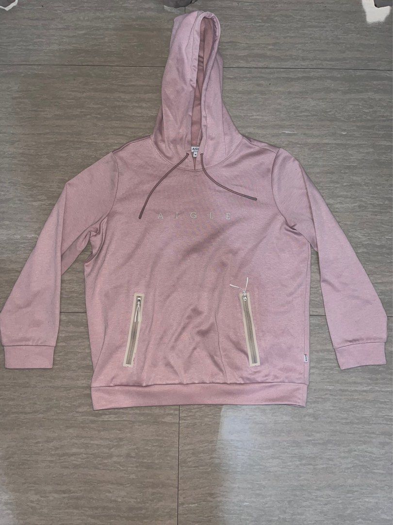 Aigle 1853 Heritage Hoodie (Category: Coats, Jackets and Outerwear) located in Lipa City. Submitted by coolthreadss (Listing ID 1415824044, Image 1). Description: • Brand: Aigle — Established in France, 1853. • Style: A premium technical pullover that combines the comfort of a sweatshirt with the durability of outdoor gear. • Color: Classic Heather Gray. • Design: * Features the iconic "Aigle 1853" circular seal logo on the chest. • High-density,