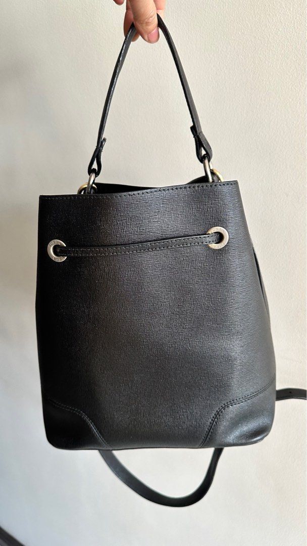 Authentic Furla Black Bucket Bag (Medium) (Category: Luxury Bags & Wallets) located in Manila. Submitted by pamsayat (Listing ID 1414992588, Image 2). Description: Measurements: 10 height x 9 length x 5 width (inches) Condition: • Leather and handle are intact Issues: • Signs of use inside • Faded front hole hardware Reminders: • Last price is already posted and non-negotiable. • This is a preloved bag. Please expect some imperfections due to pri