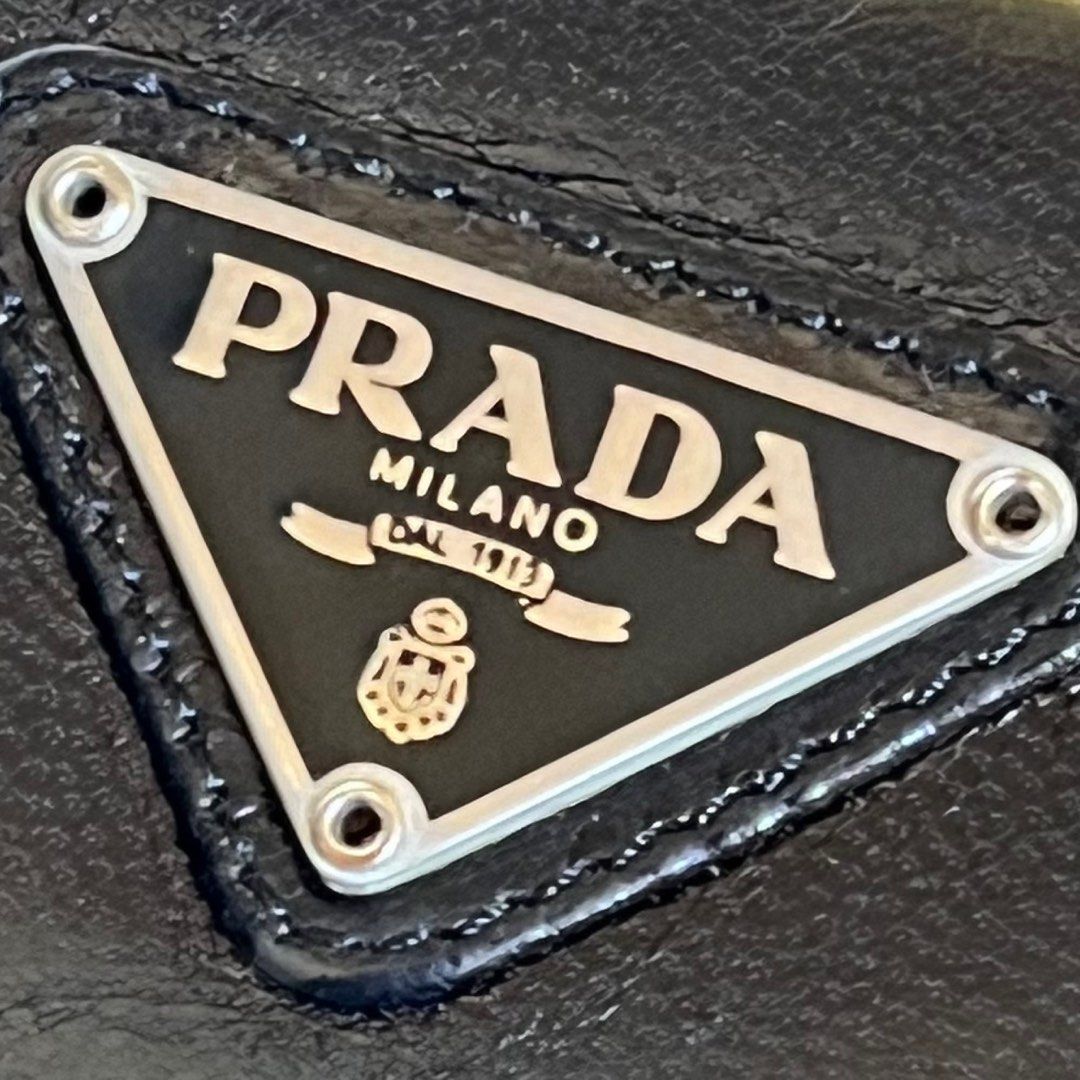 Authentic Preloved Prada Black Medium Trifold Wallet (Category: Luxury Bags & Wallets) located in Quezon City. Submitted by tokyoluxestuff2013 (Listing ID 1415853961, Image 3). Description: Authentic Preloved Prada Black Medium Trifold Wallet 15.5cm W x 11.5 cm H No inclusion Shipping via LBC/ Grab/ Lalamove Add shipping fee.