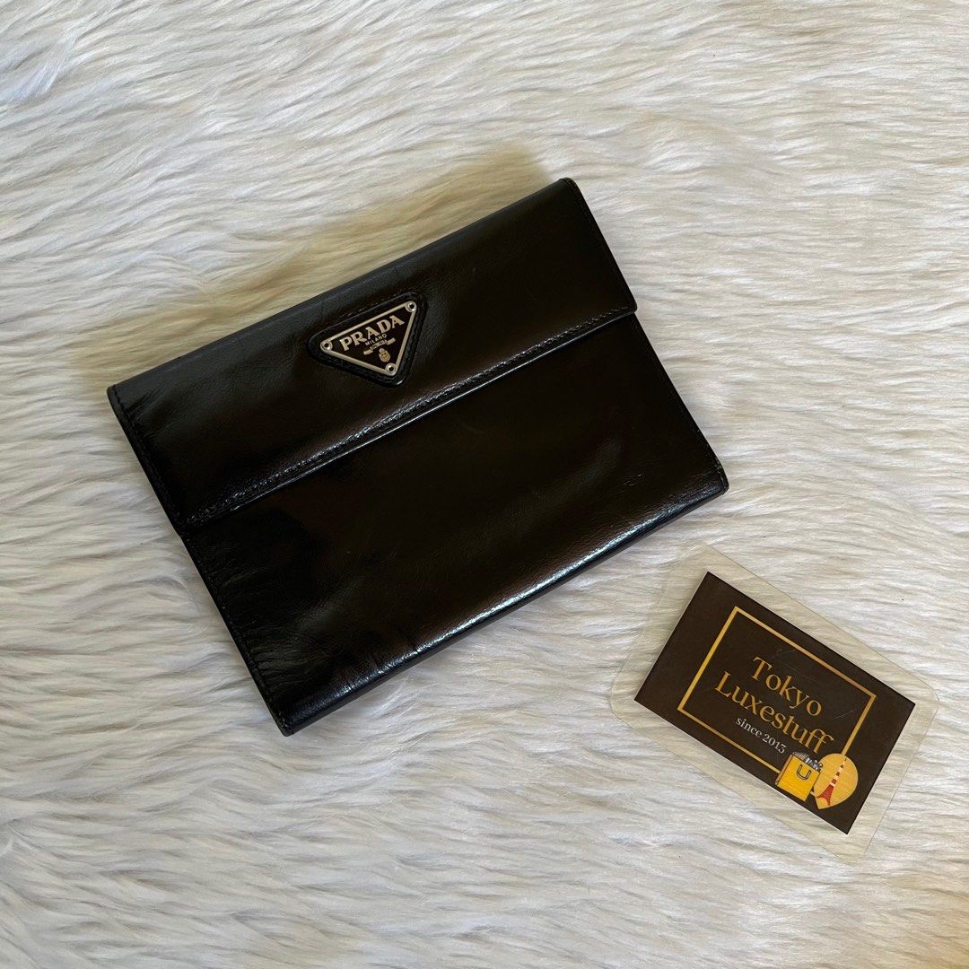 Authentic Preloved Prada Black Medium Trifold Wallet (Category: Luxury Bags & Wallets) located in Quezon City. Submitted by tokyoluxestuff2013 (Listing ID 1415853961, Image 1). Description: Authentic Preloved Prada Black Medium Trifold Wallet 15.5cm W x 11.5 cm H No inclusion Shipping via LBC/ Grab/ Lalamove Add shipping fee.