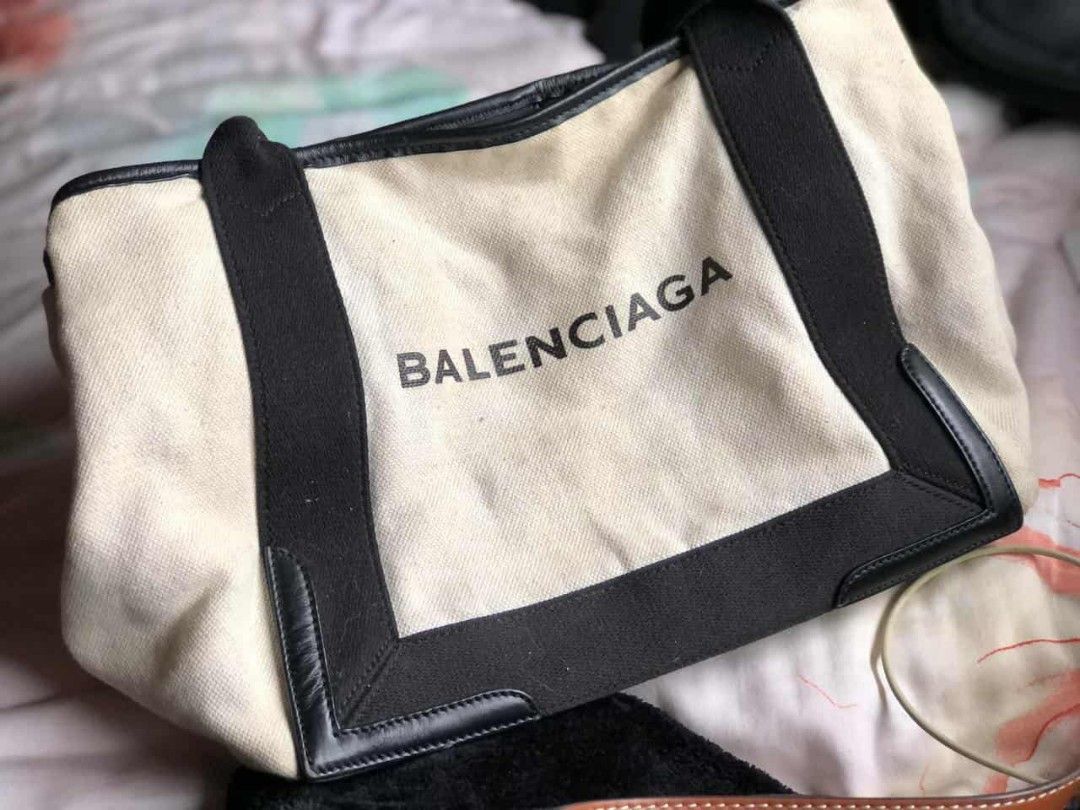 BALENCIAGA SMALL NAVY CABAS TOTE BAG (Category: Luxury Bags & Wallets) located in Cavite. Submitted by biibz4thrift (Listing ID 1415992802, Image 1). Description: Make Some Good Deals 🔥.
