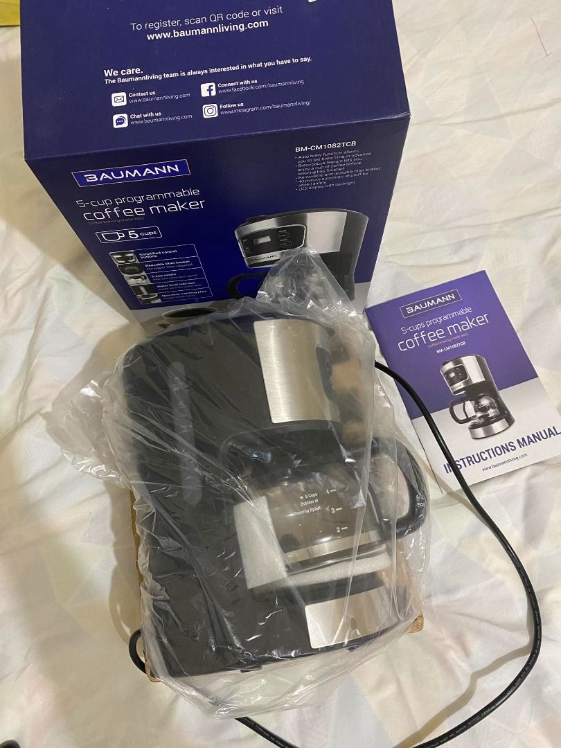 Baumann 5-Cup Programmable Coffee Maker – New (Category: Coffee Machines & Makers) located in Taguig. Submitted by erikadchvz (Listing ID 1415884869, Image 2). Description: Baumann Living 5‑Cup Programmable Coffee Maker A compact drip coffee maker ideal for small households or daily brewed coffee on a budget. Programmable with clear LCD display — set brew time in advance. Brew-pause feature lets you pour a cup mid-cycle. Reusable filter basket (n