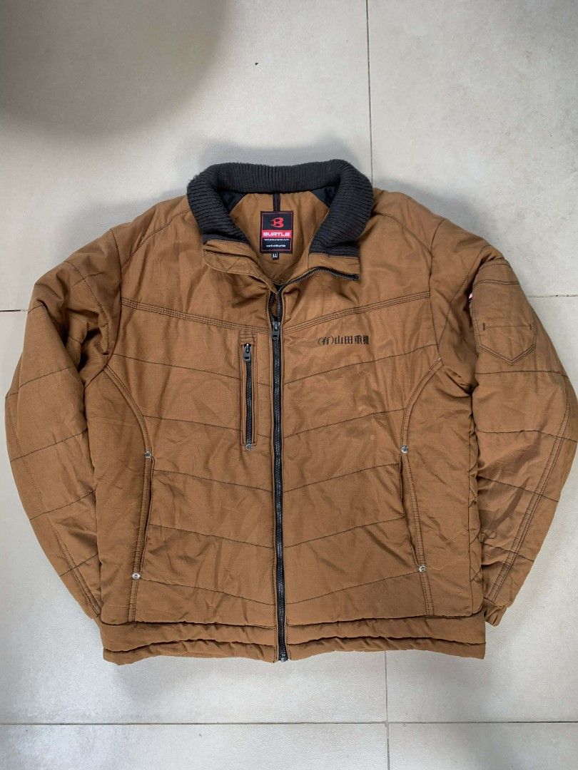 Burtle Brown Jacket (Category: Coats, Jackets and Outerwear) located in Quezon City. Submitted by chic.on.a.dime (Listing ID 1415863475, Image 1). Description: - Brown Burtle jacket - Black collar - Size: L-XL - Zipper closure - Multiple pockets (chest, sides and inside) - Quilted design - Black lining - Japanese text on sleeve - Japanese workwear jacket - Heavy jacket NOTE: MANAGE YOUR EXPECTATIONS ‼️📢 - color may vary due to lighting - please 