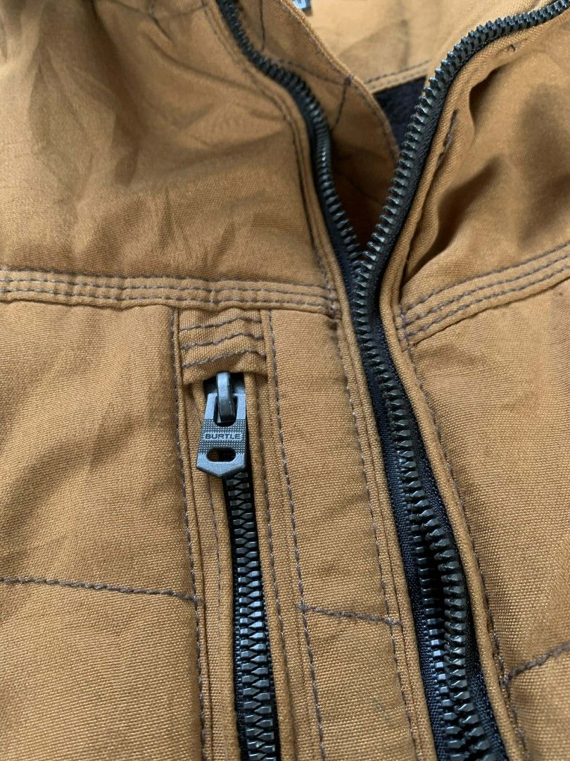 Burtle Brown Jacket (Category: Coats, Jackets and Outerwear) located in Quezon City. Submitted by chic.on.a.dime (Listing ID 1415863475, Image 2). Description: - Brown Burtle jacket - Black collar - Size: L-XL - Zipper closure - Multiple pockets (chest, sides and inside) - Quilted design - Black lining - Japanese text on sleeve - Japanese workwear jacket - Heavy jacket NOTE: MANAGE YOUR EXPECTATIONS ‼️📢 - color may vary due to lighting - please 