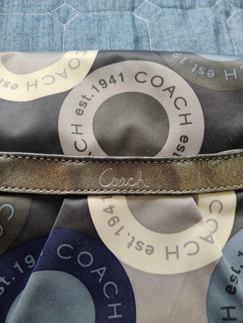 Coach Messenger Bag (Category: Luxury Bags & Wallets) located in Manila. Submitted by dcsago (Listing ID 1415876549, Image 3). Description: Authentic Coach Crossbody / Messenger Bag Stylish and lightweight nylon bag with eye-catching Coach est. 1941 circular logo print. Features leather trim, adjustable shoulder strap, and multiple pockets for everyday essentials. Perfect for casual outings, travel, or daily use. ✔ Clean interior ✔ Durable & func