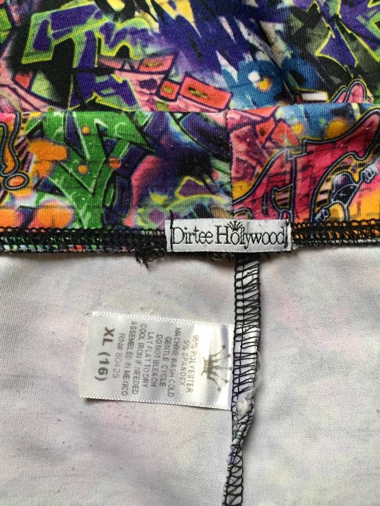 Dirtee Hollywood XL Leggings (Category: Other Bottoms) located in General Santos City (Dadiangas). Submitted by ssssshhhhhhhhh (Listing ID 1415950075, Image 3). Description: Dirtee Hollywood leggings, size XL (16). Features a colorful graffiti print. Made of polyester/spandex blend. Hand wash only..