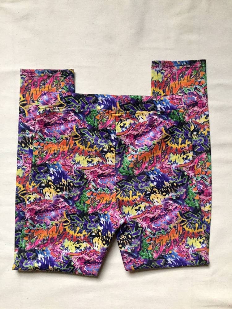 Dirtee Hollywood XL Leggings (Category: Other Bottoms) located in General Santos City (Dadiangas). Submitted by ssssshhhhhhhhh (Listing ID 1415950075, Image 2). Description: Dirtee Hollywood leggings, size XL (16). Features a colorful graffiti print. Made of polyester/spandex blend. Hand wash only..