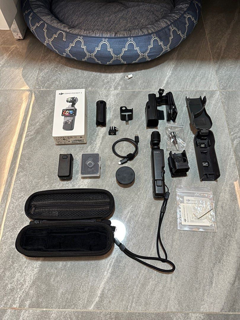 DJI Osmo Pocket 3 with accessories (Category: Cameras) located in Taguig. Submitted by blessthismessph (Listing ID 1415936780, Image 3). Description: DJI Osmo Pocket 3 - Handheld 1-Inch CMOS & 4K/120fps | 2-Inch Rotatable Screen What’s included in the Standard Combo: - Osmo Pocket 3 - Osmo Pocket 3 Handle with 1/4” Thread - Wrist Strap - Osmo Pocket 3 Cover - Type C Charger What I bought as additional accessories which are ALL INCLUDED 2 in 1 Set