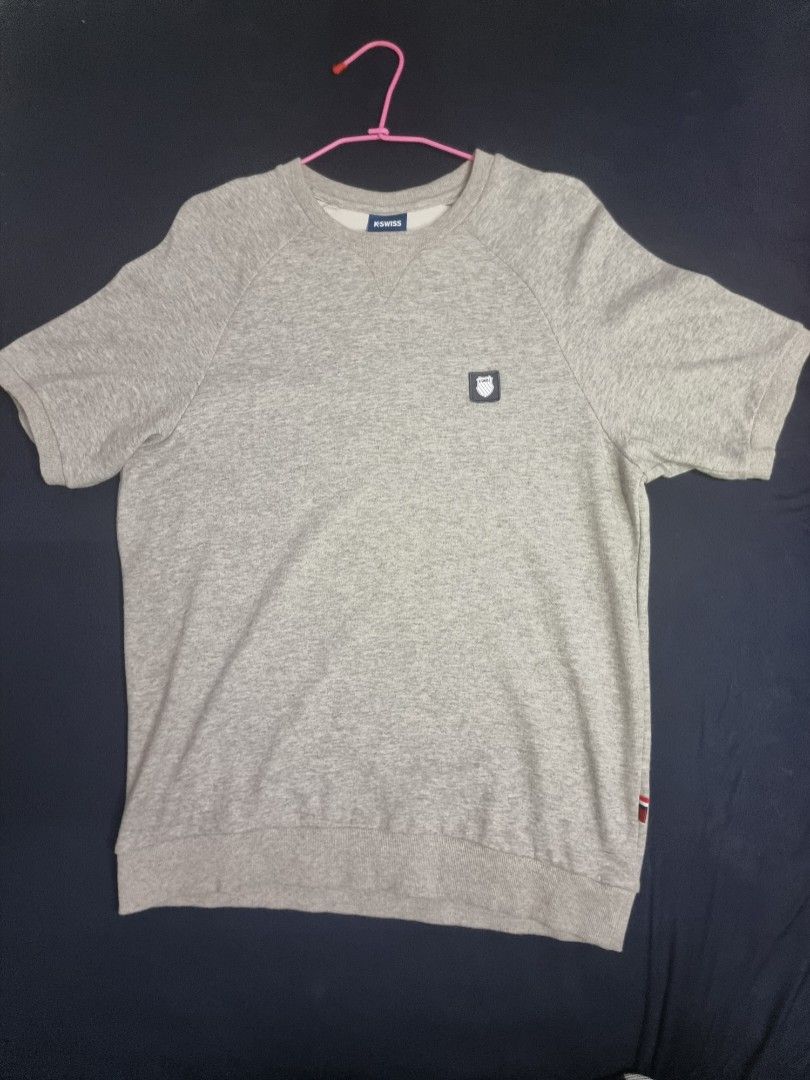 Grey Short Sleeve T-shirt (Category: Tshirts & Polo Shirts ) located in Manila. Submitted by themvi (Listing ID 1415932871, Image 1). Description: Grey short sleeve t-shirt with a small chest logo, crew neck, and short sleeves. Soft, comfortable material. .