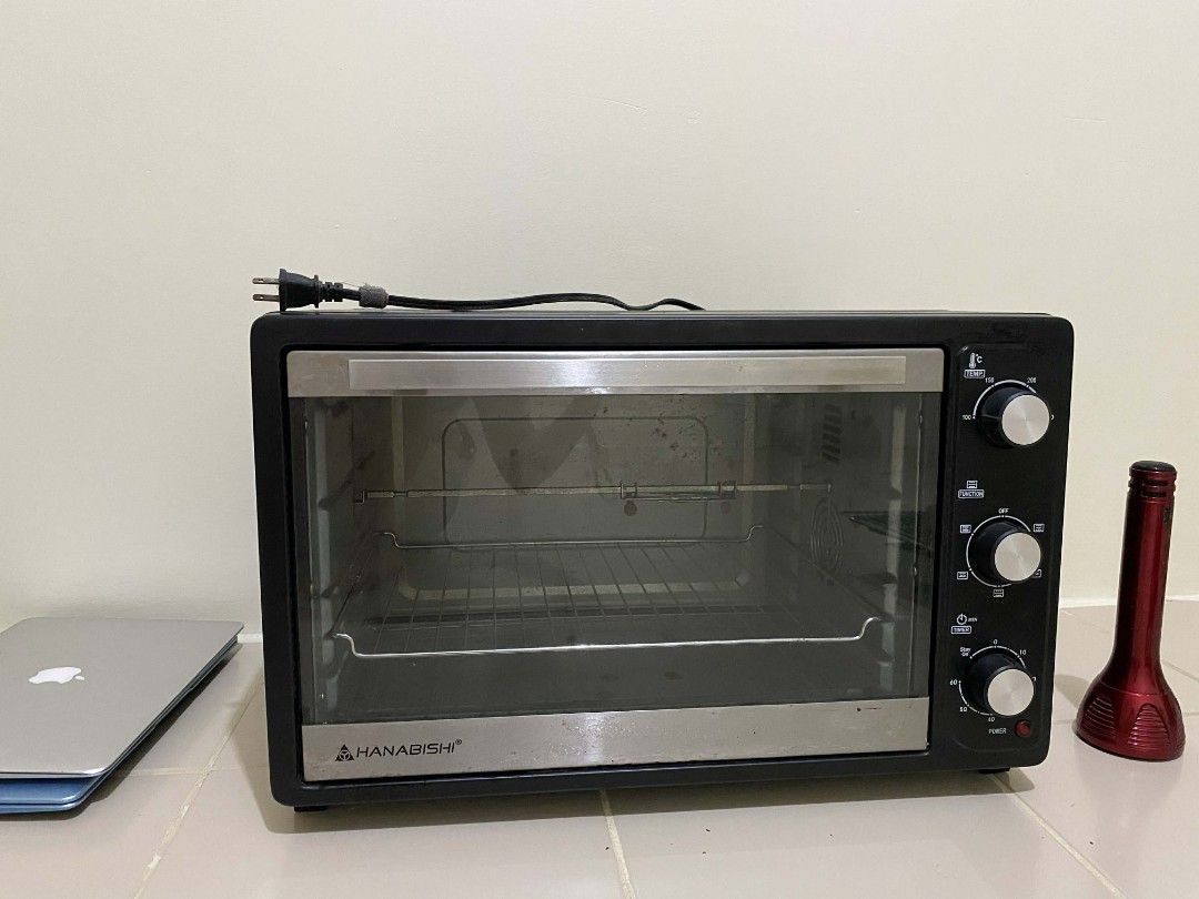 Hanabishi Electric Oven with Accessories (Category: Ovens & Toasters) located in Manila. Submitted by colabear025 (Listing ID 1415970716, Image 1). Description: - Hanabishi electric oven - Includes baking trays and wire rack - Temperature and function controls - Glass door for easy viewing - Black exterior - In good working condition buyer will shoulder sf rfs: quit baking loc: tondo, manila .