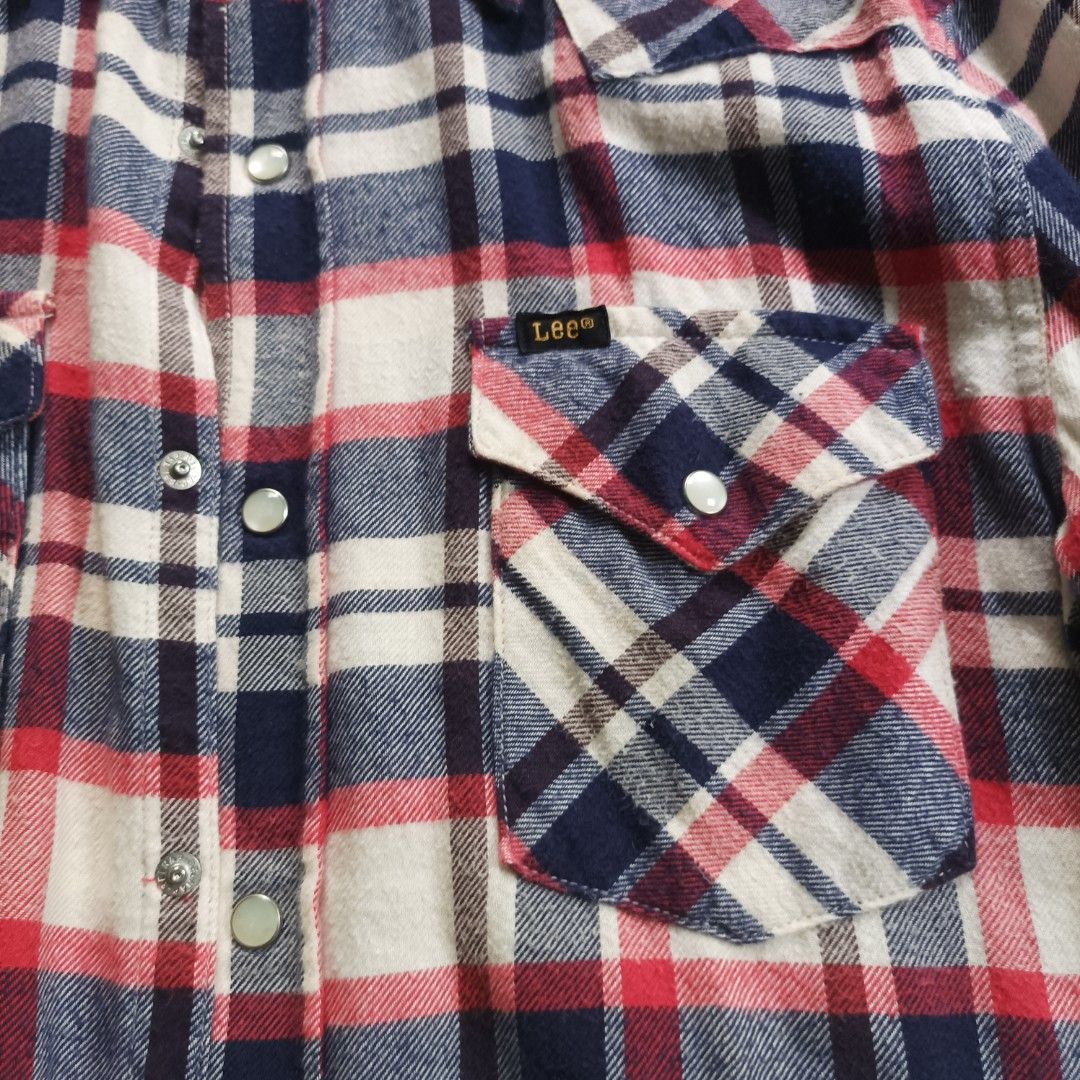 Lee Western Plaid Flannel Shirt (Category: Tshirts & Polo Shirts ) located in Makati City. Submitted by enz0_ (Listing ID 1415894276, Image 3). Description: - Lee flannel shirt - Classic red, white, and blue plaid pattern - Two chest pockets - Snap closures - Long sleeves - Collared neckline - Measurements in images - Stylish and comfortable.