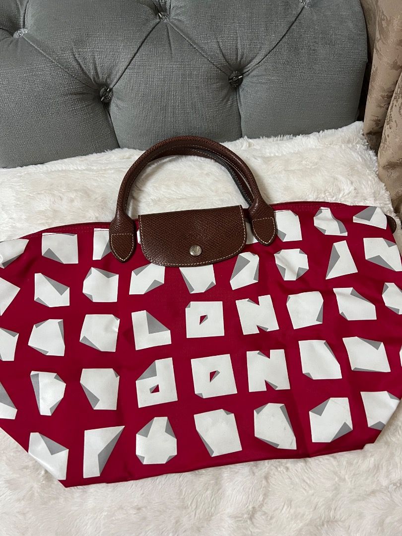 LONGCHAMP Authentic 💯 (Category: Tote Bags) located in Manila. Submitted by cluttercrushers (Listing ID 1415883181, Image 1). Description: Longchamp x Vahram Muratyan Le Pliage shopping tote in red nylon with a graphic print Limited Edition.
