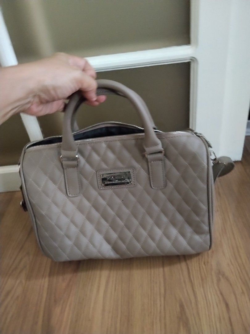 Mango Quilted Handbag (Category: Luxury Bags & Wallets) located in Bacoor. Submitted by fashionpinay (Listing ID 1415872520, Image 1). Description: - Mango handbag with quilted design - Top handle - Zipper closure - Rectangular shape - Small metal brand plate - Lined interior - Versatile for everyday use.
