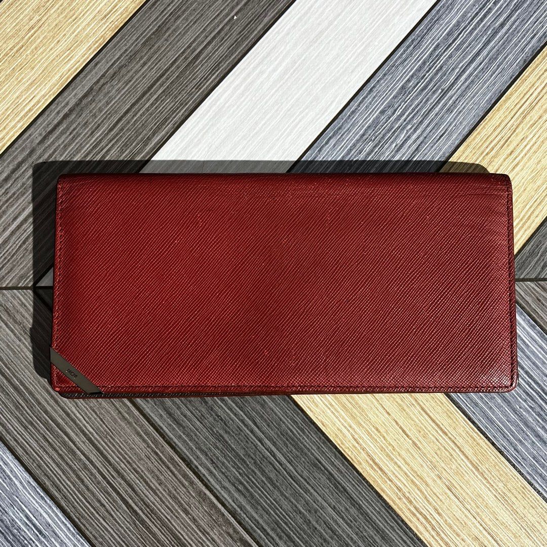 MCM Burgundy Long Wallet (Category: Luxury Bags & Wallets) located in Daraga. Submitted by th3cliquejunks (Listing ID 1415962018, Image 1). Description: MCM Burgundy Long Wallet - Authentic Condition: 9/10 Issue: Minor Dents No major flaw Can provide more pics upon request 1,500 Dm to purchase .