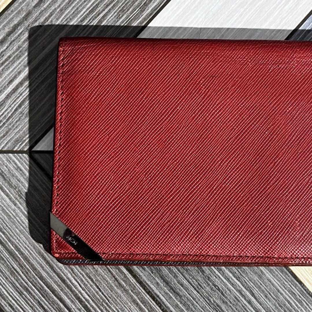 MCM Burgundy Long Wallet (Category: Luxury Bags & Wallets) located in Daraga. Submitted by th3cliquejunks (Listing ID 1415962018, Image 2). Description: MCM Burgundy Long Wallet - Authentic Condition: 9/10 Issue: Minor Dents No major flaw Can provide more pics upon request 1,500 Dm to purchase .