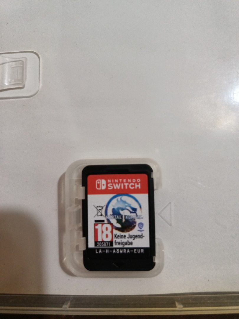 Mortal Kombat 1 - Nintendo Switch Game (Category: Nintendo) located in Bulacan. Submitted by andiela (Listing ID 1415932558, Image 1). Description: - Mortal Kombat 1 for Nintendo Switch - Rated 18+ - Cartridge only - Fighting game - sale / swap - preferred Animal Crossing New horizon or Monster Hunter Sunbreak or you can offer.