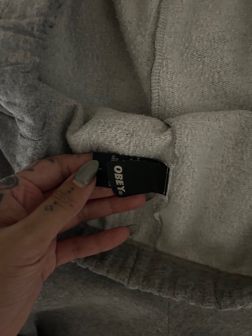 Obey Posse Sweatpants - Gray - Large (Category: Joggers) located in Manila. Submitted by tonsdeclutter (Listing ID 1415943117, Image 3). Description: Gray Obey Posse sweatpants with drawstring - Features the Obey Posse logo printed on the side of the legs - Large - Made of a cotton and polyester blend - Issue: There are some paint stains on the pants - The tag is visible in the images -selling for PHP 180 + sf.