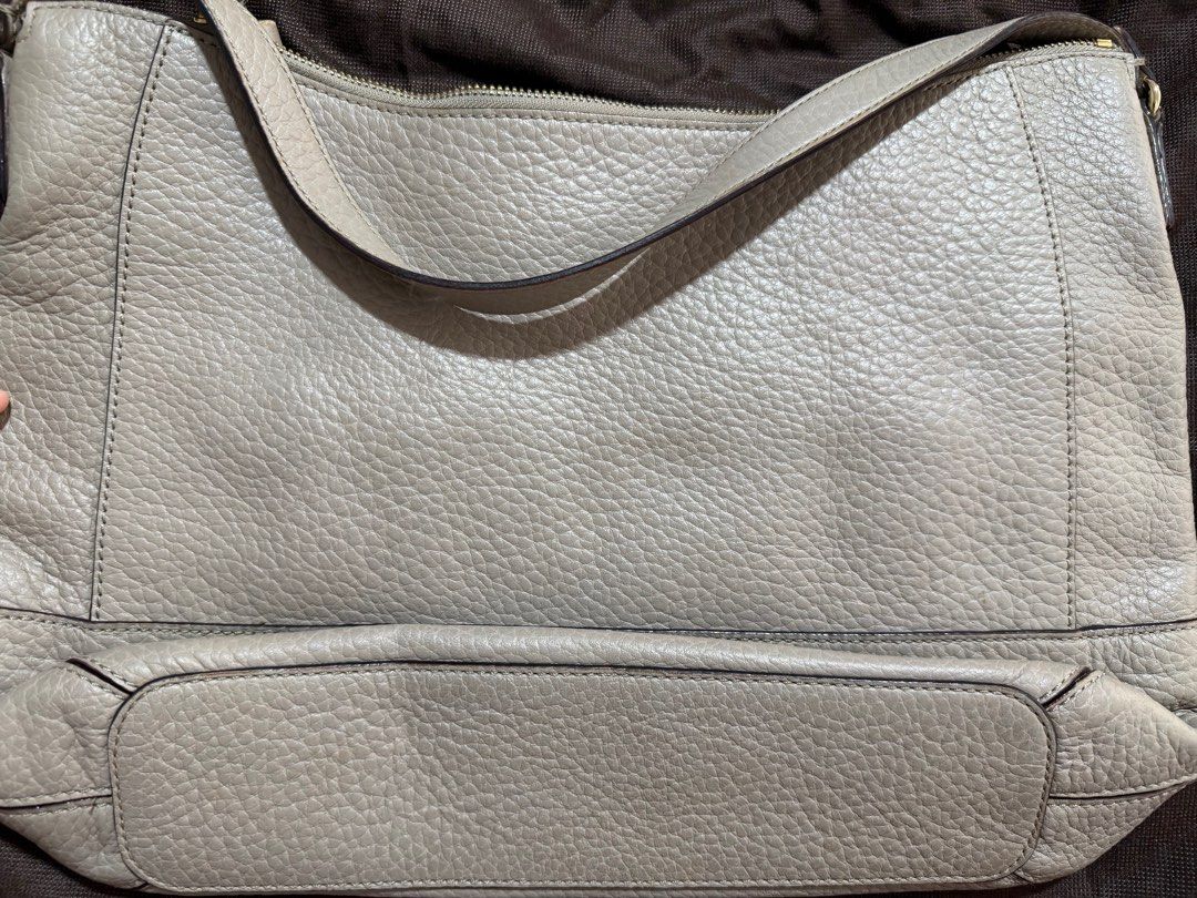 Original Kate Spade Shoulder Bag with Tassel (Category: Luxury Bags & Wallets) located in Pasig City. Submitted by gethege (Listing ID 1415851859, Image 3). Description: Original kate spade leather shoulder bag No tears or stains Needs cleaning.