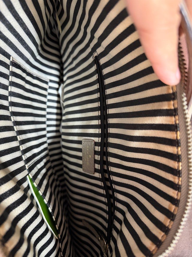 Original Kate Spade Shoulder Bag with Tassel (Category: Luxury Bags & Wallets) located in Pasig City. Submitted by gethege (Listing ID 1415851859, Image 2). Description: Original kate spade leather shoulder bag No tears or stains Needs cleaning.