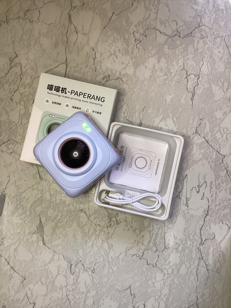 Paperang P1 (Category: Printers, Scanners & Copiers) located in Tarlac. Submitted by trufflemunch (Listing ID 1415883163, Image 2). Description: Compact and portable thermal printer designed for printing labels, notes, photos and more. It connects wirelessly via Bluetooth to your smartphone, tablet or directly to your PC. Inclusions are the device itself, user’s manual, charging wire and comes with a free silicone protector. .