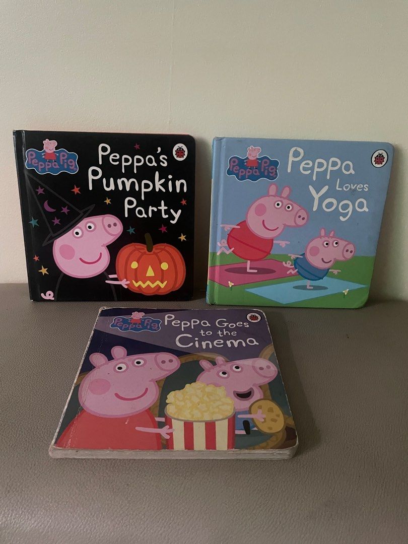 Peppa Pig Board Books Set (Category: Children's Books) located in Quezon City. Submitted by mdsiazon (Listing ID 1416010078, Image 1). Description: - Includes three Peppa Pig board books. - Titles: "Peppa's Pumpkin Party", "Peppa Loves Yoga", and "Peppa Goes to the Cinema". - Designed for young children. - Features colorful illustrations and Peppa Pig characters. - Ideal for reading and learning..