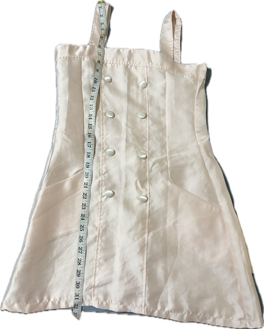 Salmon Pink Structured Dress (Category: Dresses) located in Mabalacat. Submitted by regardlessk (Listing ID 1415863212, Image 3). Description: - Light pink mini dress - Square neckline - Double-breasted button design - Adjustable straps - Back zipper closure - Measurements in photos.