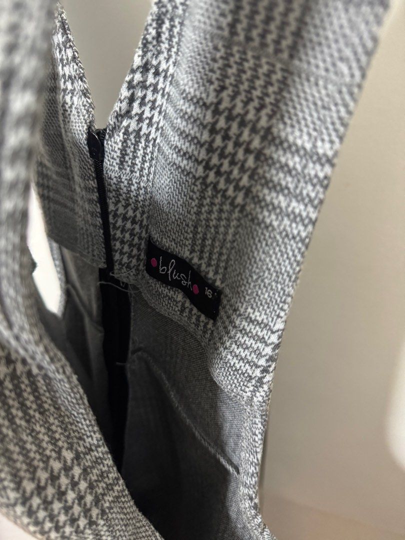 Plaid Jumpsuit (Category: Jumpsuits) located in Mandaluyong City. Submitted by mainesells_ (Listing ID 1416005077, Image 2). Description: - Classic gray plaid pattern with zipper closure - Stretchy material - 118 cm length - 25 cm shoulder to shoulder width - 38 cm below waist width.