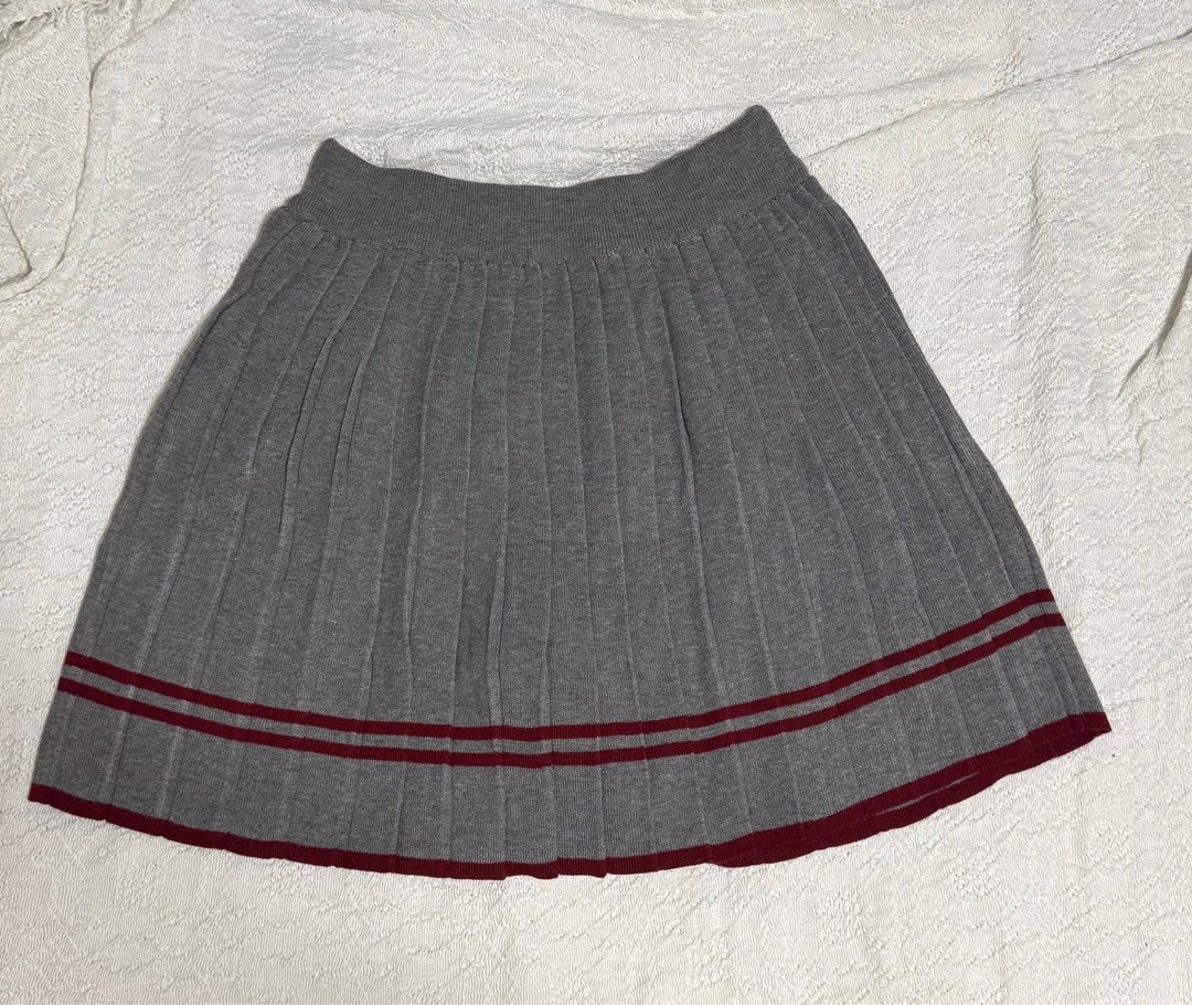 Pleated Gray Skirt with Maroon Stripes (Category: Skirts) located in Mandaluyong City. Submitted by mainesells_ (Listing ID 1416006889, Image 1). Description: - Gray pleated knit skirt - Stretchy waistband; 24-30 - Length: 41 cm - Bought for ₱400 in SM.