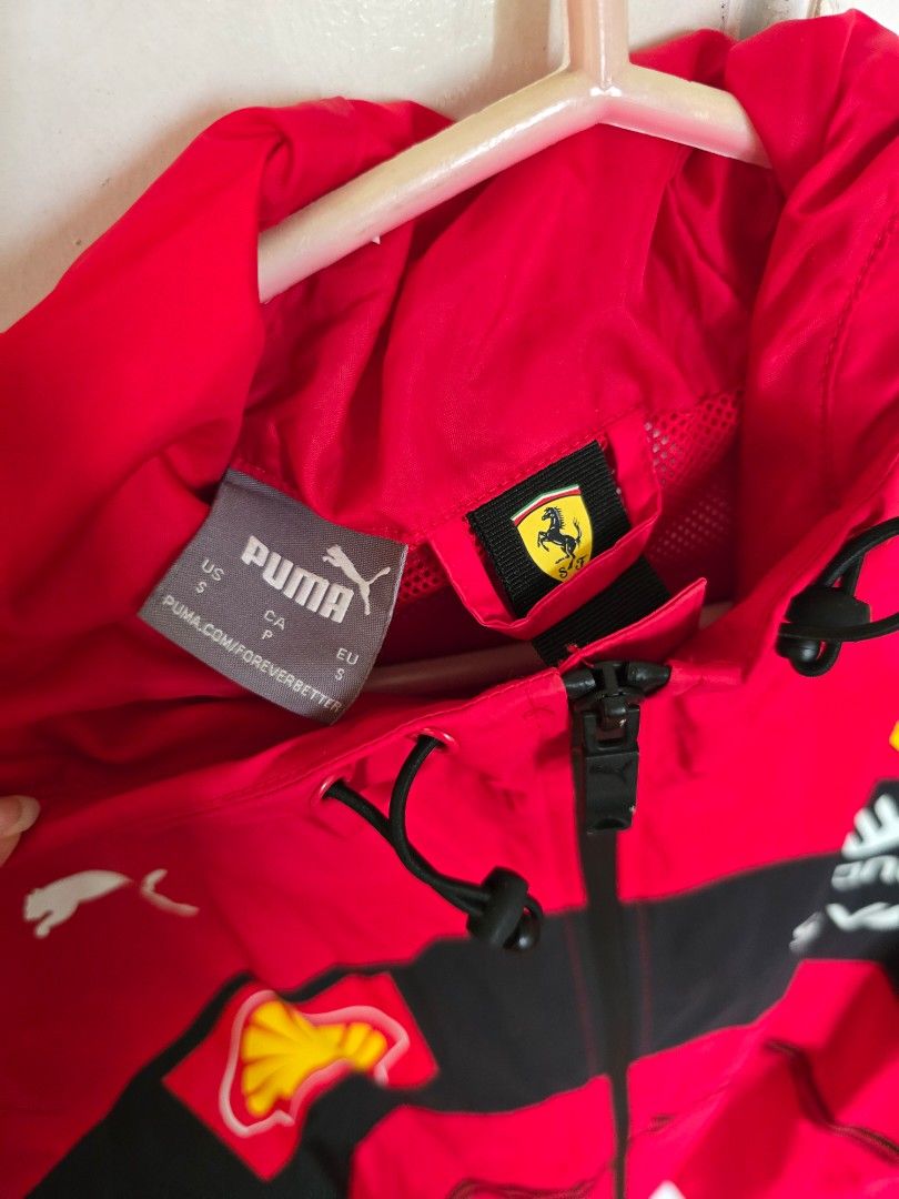 Puma Ferrari Jacket (Category: Coats, Jackets and Outerwear) located in Quezon City. Submitted by quirkfox77 (Listing ID 1415909067, Image 2). Description: - Puma Ferrari F1 2022 - Size: S - Color: Red and black - Features: Hood and zipper closure - Logos: Ferrari, Shell, and Puma - Design: Black stripes on sleeves - No flaws! - Bought from FuelForFans for €168 (Php 11k) RFS: Carlo Sainz Fan, so I've switch to Williams now. Open to reasonable off