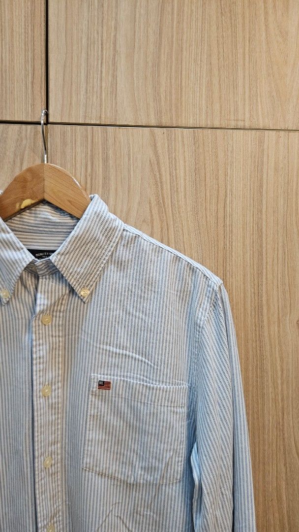 Ralph Lauren Striped Shirt (Category: Tshirts & Polo Shirts ) located in Alfonso. Submitted by jbcamet (Listing ID 1415997620, Image 2). Description: - Ralph Lauren striped shirt - Light blue and white striped pattern - Button-down design - Features a chest pocket - Small logo on chest pocket - Ralph Lauren Jeans Company label.