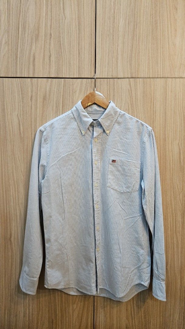 Ralph Lauren Striped Shirt (Category: Tshirts & Polo Shirts ) located in Alfonso. Submitted by jbcamet (Listing ID 1415997620, Image 1). Description: - Ralph Lauren striped shirt - Light blue and white striped pattern - Button-down design - Features a chest pocket - Small logo on chest pocket - Ralph Lauren Jeans Company label.