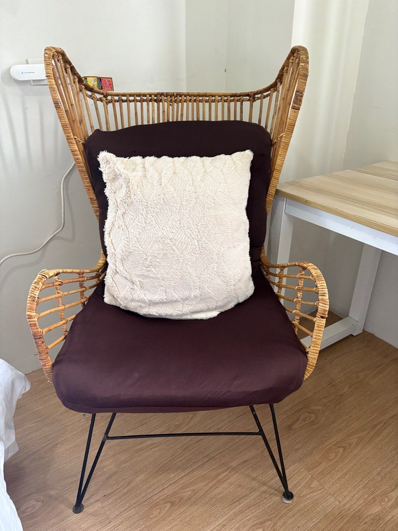 RUSH Rattan Wicker Chair with Cushion (Category: Chairs) located in Quezon City. Submitted by wolfkeith (Listing ID 1415873883, Image 2). Description: Locally made stylish rattan wicker chair Includes: -free foldable seat cushion with 2 washable covers - fluffy white pillow with washable cover Features: - Unique high-back design - Black metal legs - Adds a touch of bohemian style - Sturdy and well-constructed Also selling table and lamp as a set 