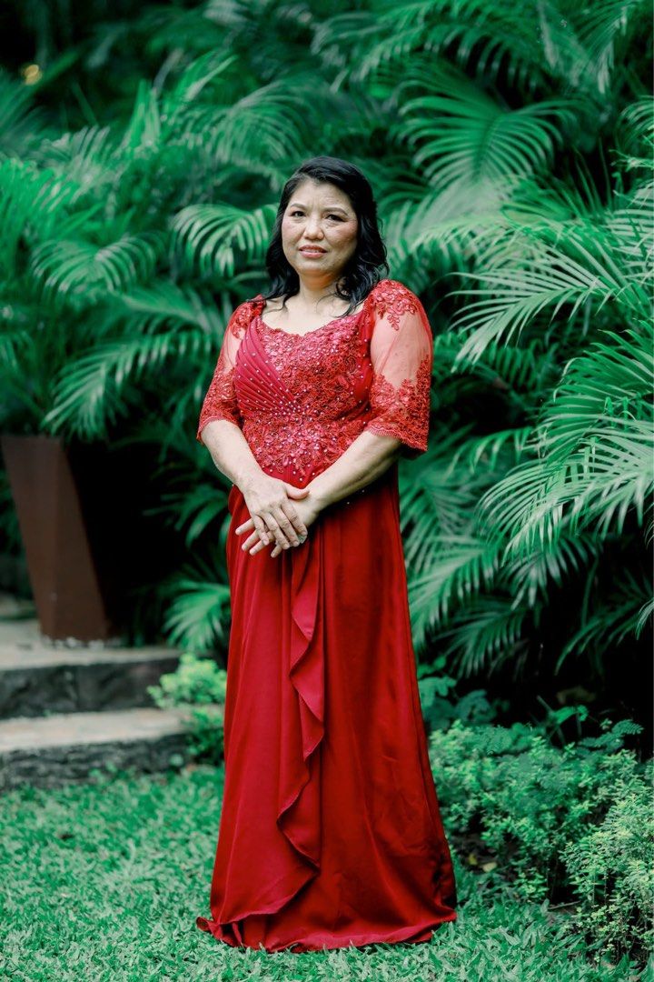 Mother Gown (Category: Evening dresses & gowns) located in Makati City. Submitted by bree73 (Listing ID 1415925697, Image 1). Description: - Red formal gown - Intricate lace detailing - Floor-length design - Flattering silhouette - Ideal for weddings and galas - Well-maintained and ready to wear Only worn once.