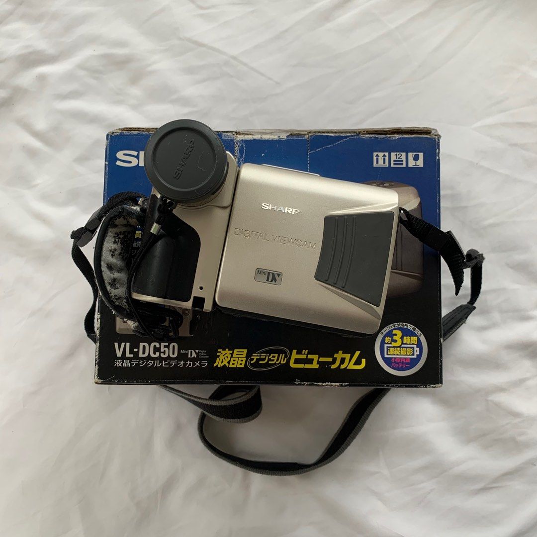 Sharp VL-DC50 MiniDV Digital Viewcam Camcorder (Category: Cameras) located in Tagaytay City. Submitted by deetstreet (Listing ID 1415826668, Image 1). Description: - As is - Missing charger + sf .