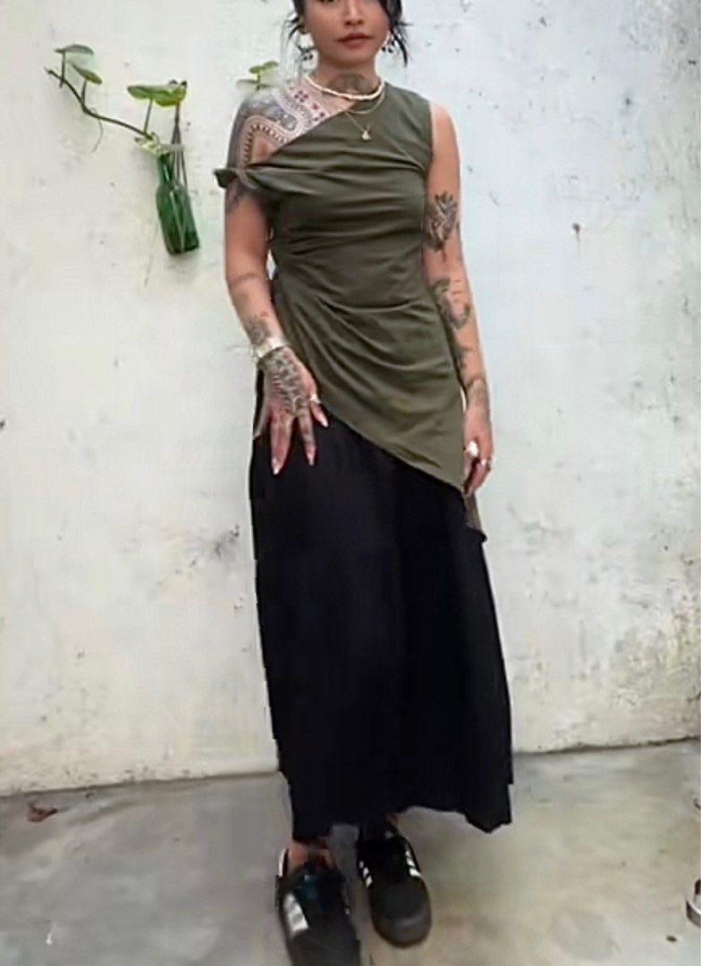 SHEIN One Shoulder Top (Category: Sleeveless) located in Manila. Submitted by tonsdeclutter (Listing ID 1415981862, Image 3). Description: - SHEIN olive green one-shoulder top - Size: M (EU 38, US 4) - Asymmetrical design - Draped front - Lightweight fabric - Perfect for a chic outfit - Used once - Rfs: Gained a bit of weight .