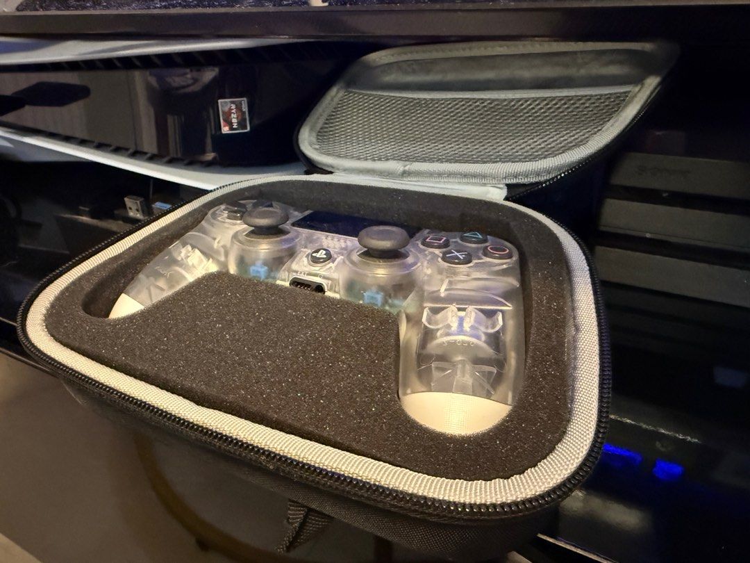 Sony PlayStation 4 Pro Console with 2 Controller and Charging dock (Category: PlayStation) located in Subic. Submitted by robertmfernandez (Listing ID 1416001208, Image 3). Description: - Sony PlayStation 4 Pro console (black) - Two controllers: - One black controller - One clear design controller with carrying case - Charging station with slots for two controllers LBC COP 2 ps4 games included Mortal Kombat XL JUMP FORCE Marvel vs Capcom: Infinit