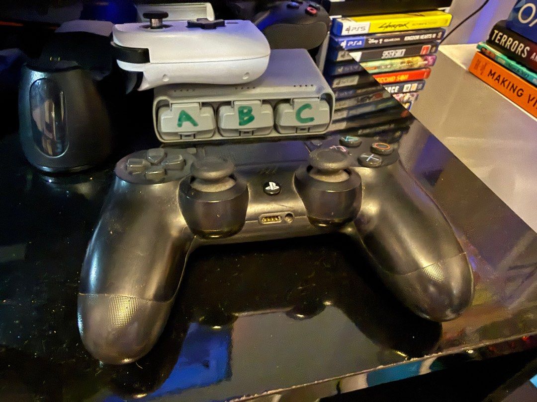 Sony PlayStation 4 Pro Console with 2 Controller and Charging dock (Category: PlayStation) located in Subic. Submitted by robertmfernandez (Listing ID 1416001208, Image 2). Description: - Sony PlayStation 4 Pro console (black) - Two controllers: - One black controller - One clear design controller with carrying case - Charging station with slots for two controllers LBC COP 2 ps4 games included Mortal Kombat XL JUMP FORCE Marvel vs Capcom: Infinit