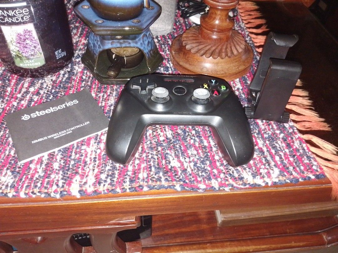 SteelSeries Nimbus Wireless Controller (Category: Controllers) located in Paranaque City. Submitted by zackzero (Listing ID 1415887592, Image 2). Description: - SteelSeries Nimbus wireless controller - Includes phone clip - Comes with original manual - Standard button layout - Dual analog sticks, D-pad, and action buttons - In good working condition - Perfect for mobile gaming! SteelSeries Nimbus (Model Number: GC-00004) Controller! Compatible wi