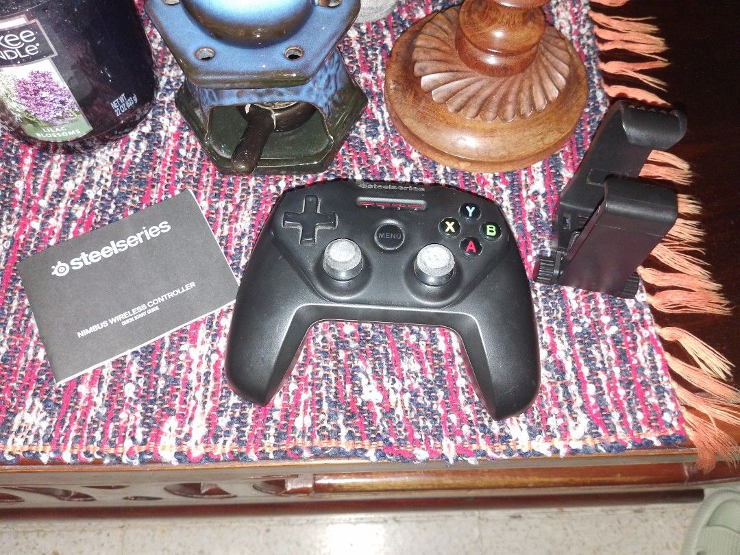 SteelSeries Nimbus Wireless Controller (Category: Controllers) located in Paranaque City. Submitted by zackzero (Listing ID 1415887592, Image 3). Description: - SteelSeries Nimbus wireless controller - Includes phone clip - Comes with original manual - Standard button layout - Dual analog sticks, D-pad, and action buttons - In good working condition - Perfect for mobile gaming! SteelSeries Nimbus (Model Number: GC-00004) Controller! Compatible wi