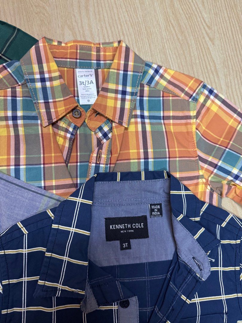 Take All: Branded Polos for Toddlers Size 3 (Category: Babies & Kids Fashion) located in Pasig City. Submitted by extrac (Listing ID 1415903205, Image 3). Description: Take all: Toddler plaid shirt bundle - Includes shirts from Carter's, Oshkosh B'gosh, and Kenneth Cole - Size: 3T - Features various plaid patterns (green, blue, orange, etc.) - Button-down closures - Collared necks - Perfect for everyday wear.