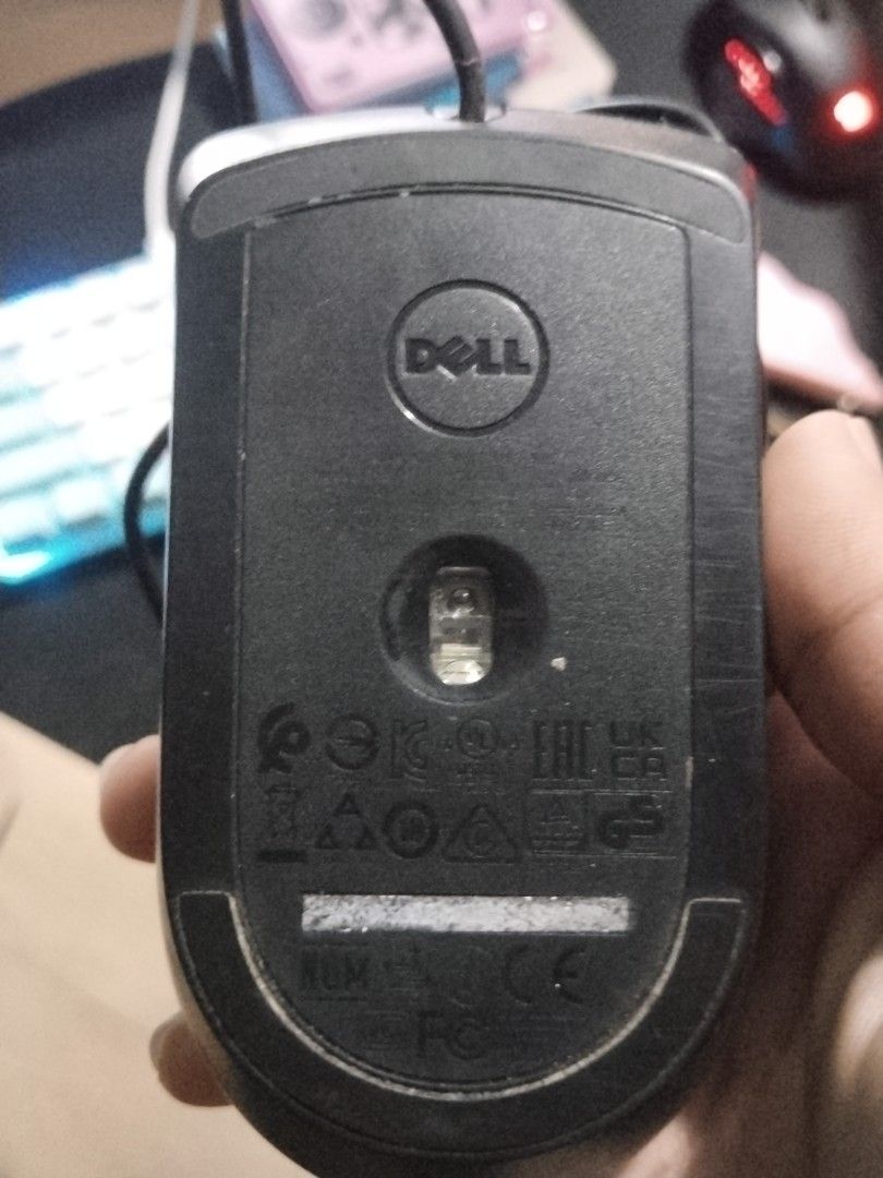 The Dell MS116 Optical Mouse (Category: Mouse & Mousepads) located in Mandaluyong City. Submitted by eyji569 (Listing ID 1415977287, Image 1). Description: - Dell wired mouse - Standard two-button design - Features a scroll wheel - Color: Black - Wired connection.